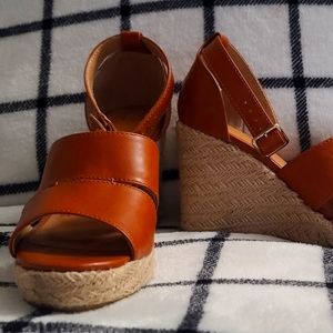 Size 6 1/2 Wedge heels brown with rope base. Time and Tru